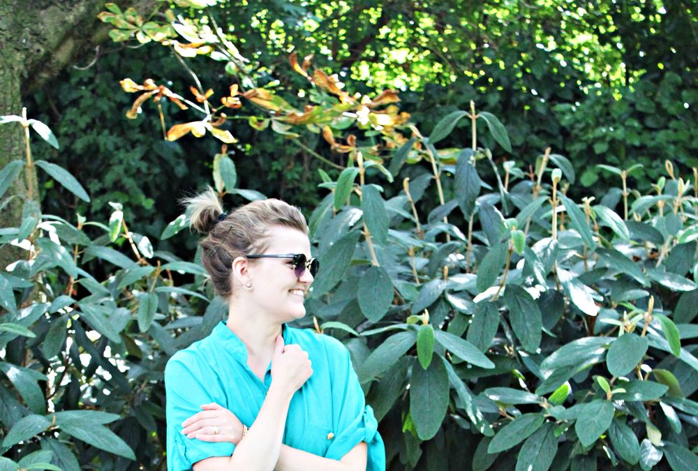 Sandra Grahl in front of greenery