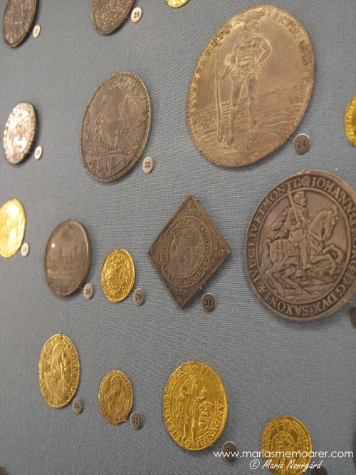 Gamla mynt i museum Myntkabinettet i Stockholm