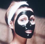 svart ansiktsmask