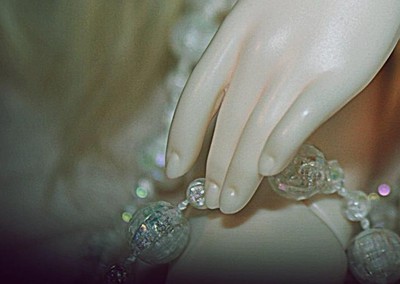 Kid delf hand with pearls